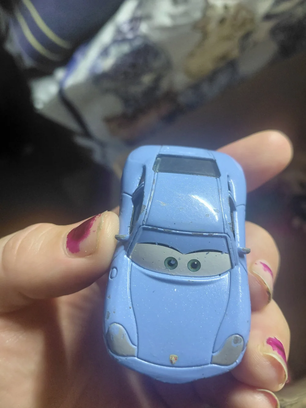 Disney Pixar Cars Sally Carrera diecast toy car.